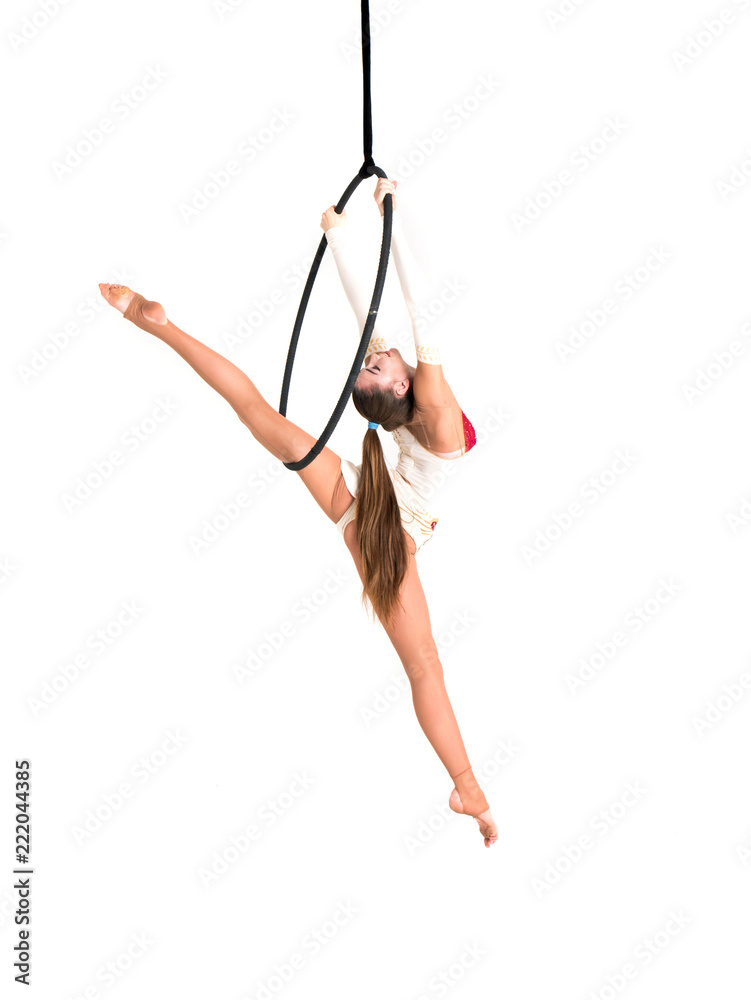 © Nikita Vasylchenko - Young girl posing in an airy ring on a white background © Nikita Vasylchenko - Young girl posing in an airy ring on a white background