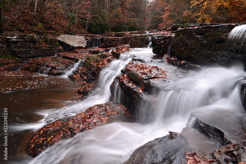 Fototapeta Naklejka Na Ścianę i Meble -  Large Waterfalls Autumn Stream
