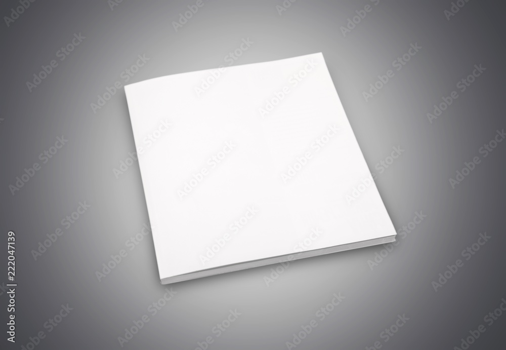 Blank book cover on black wooden background Blank book cover on black wooden background