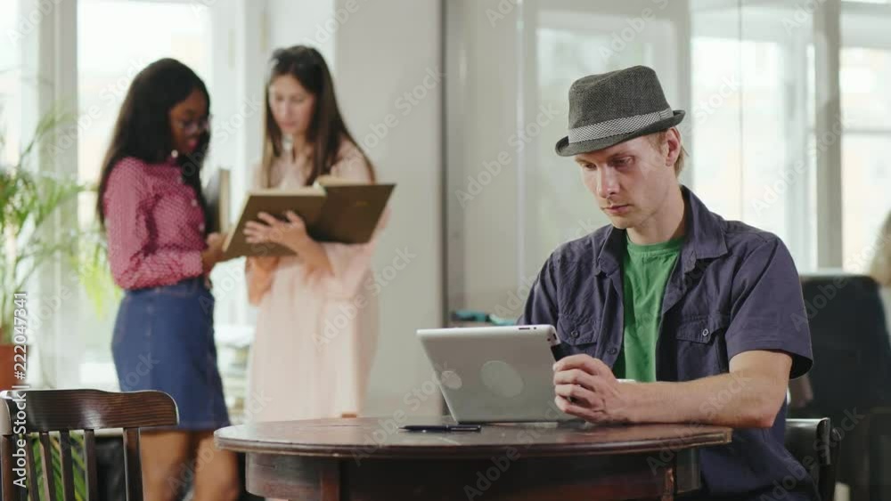 Group of young multiethnic people busy working in the office Group of young multiethnic people busy working in the office