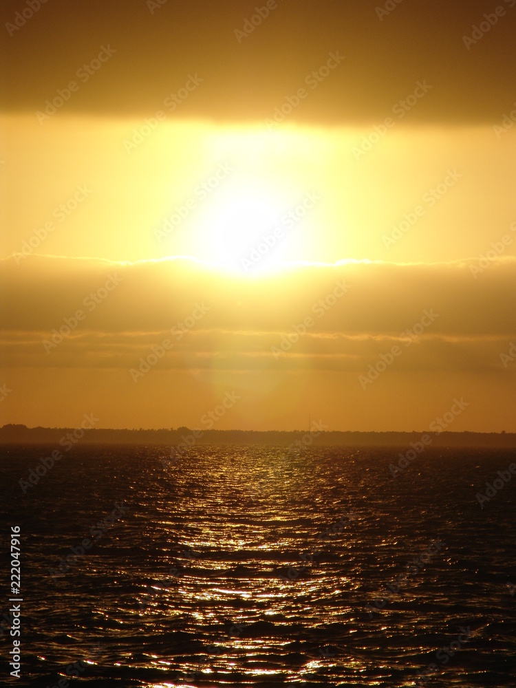 Fototapeta premium Yellow Sunset at the Ocean