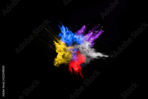 abstract colored dust explosion on a black background.abstract powder splatted background,Freeze motion of color powder exploding/throwing color powder, multicolored glitter texture.