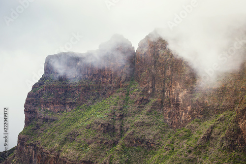 Mountain Landscape of the Masca Gorge. Beautiful views of the coast with small villages in Tenerife, Canary Islands © bondvit
