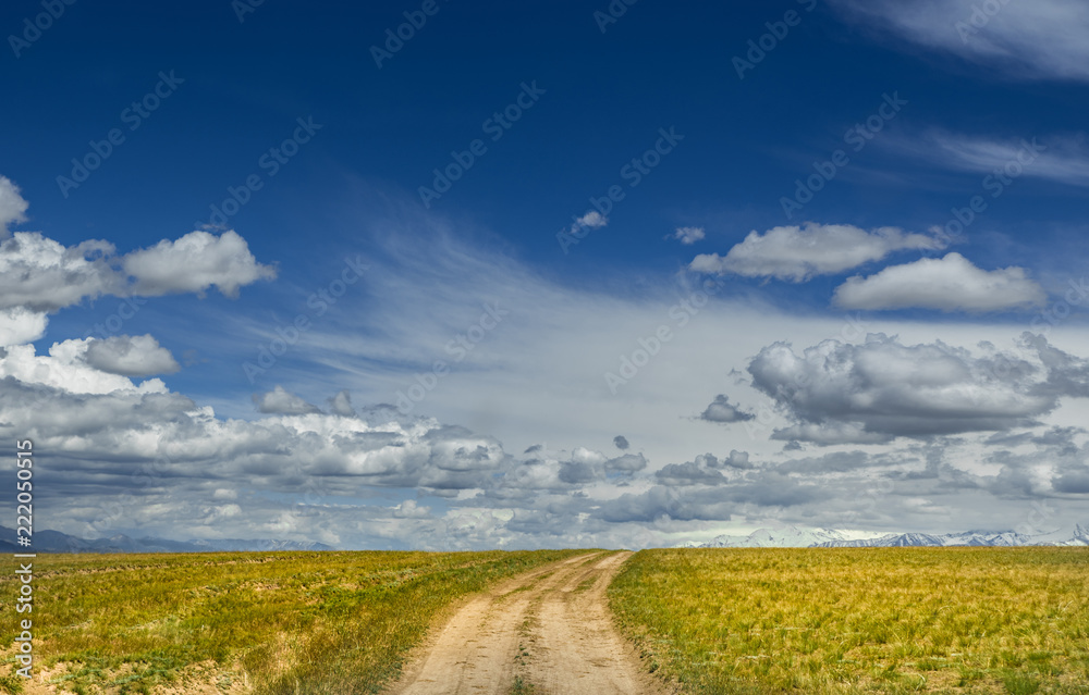 Dirt road. Summer sky. Freedom. Landscape. Sunny day sky. Dirt road. Summer sky. Freedom. Landscape. Sunny day sky.