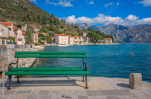 Empty bench on the  shore in Perast town