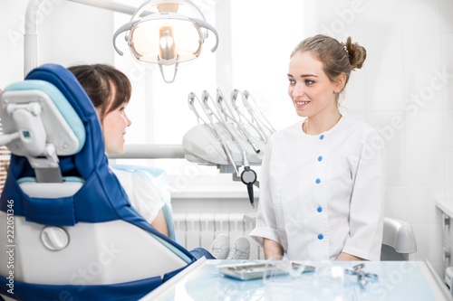 Young girl on reception at the dentist