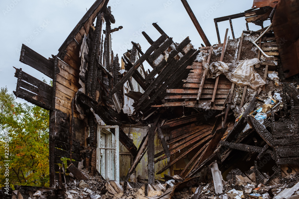 the old wooden burned-down house a view from inside the old wooden burned-down house a view from inside