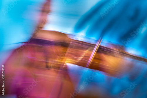 Motion blurred violonist abstract