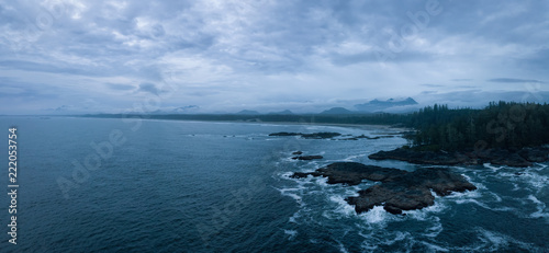 Aerial panoramic seascape view of the Pacific Ocean Coast during a cloudy summer sunset. Taken near Tofino and Ucluelet, Vancouver Island, BC, Canada. © edb3_16