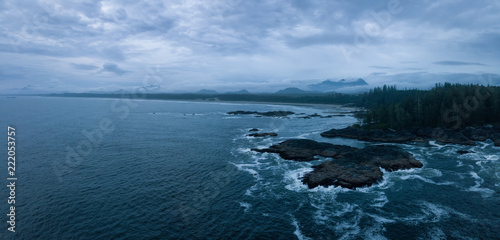 Aerial panoramic seascape view of the Pacific Ocean Coast during a cloudy summer sunset. Taken near Tofino and Ucluelet, Vancouver Island, BC, Canada. © edb3_16