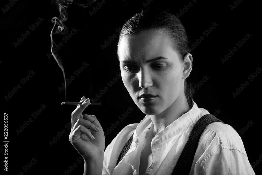 Fototapeta premium woman smoking cigarette