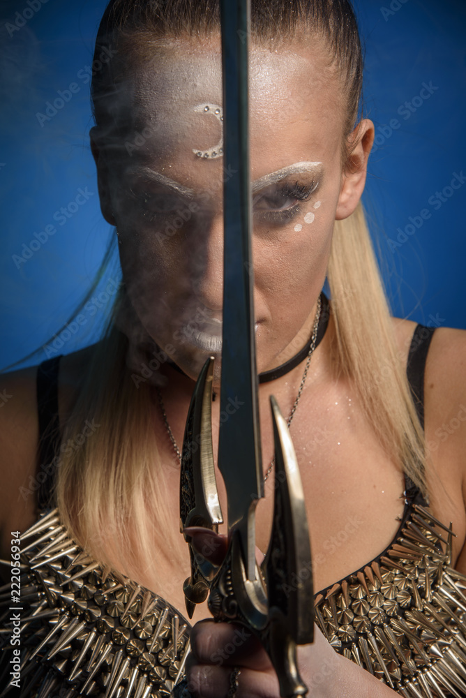 Fototapeta premium Strong tribal woman warrior, moon goddess or a priestess