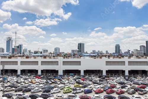 Many cars in the parking lot