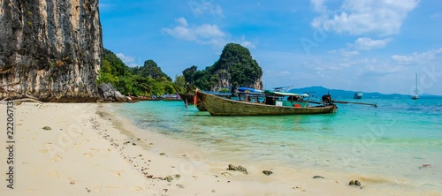 Panoramic view of perfect Thailand beach with white sand and traditional long boats © Jason Busa
