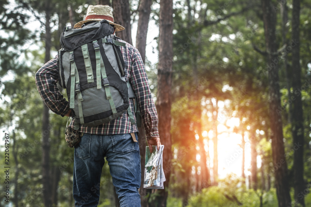 Map in hand traveler with backpack.