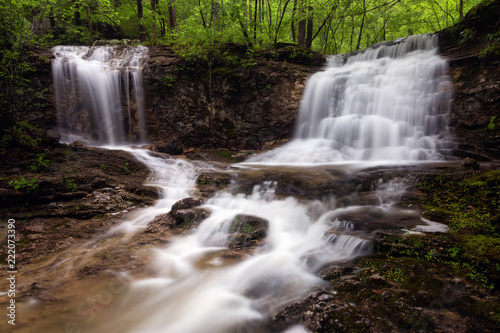 Fototapeta Naklejka Na Ścianę i Meble -  Hemmed in Twin Waterfall