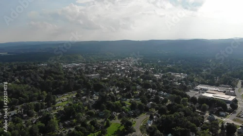 Drone footage from Poet's Seat Tower in Greenfield, Massachusetts. Aerial footage of small New England town. photo