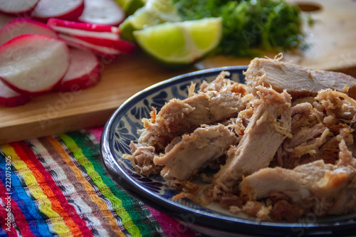 Carnitas de Puebla, con rábanos y limones  photo