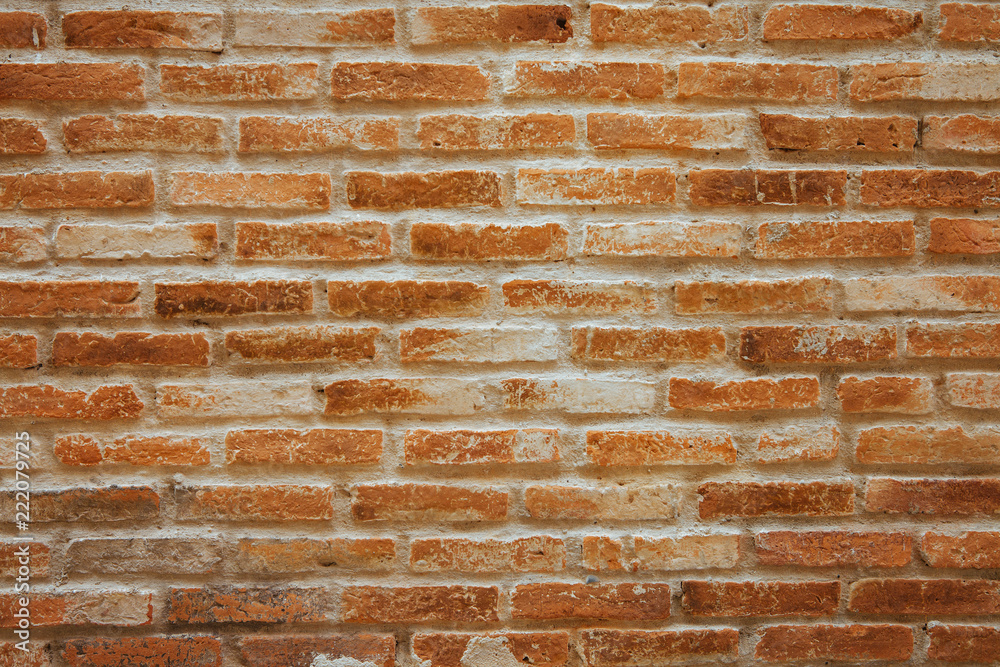 Obraz premium Old brown and red brick wall