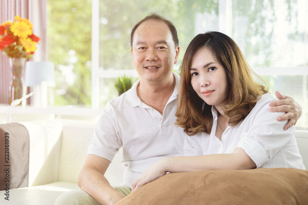 Portrait of happy asian married couple at home. Portrait of happy asian married couple at home.