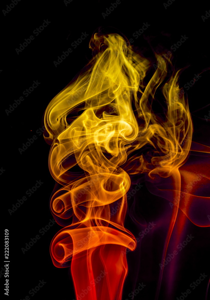 Obraz premium Colored smoke on black background