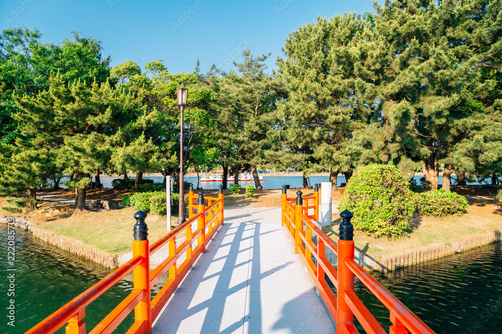 Ohori park, trees and bridge in Fukuoka, Japan
