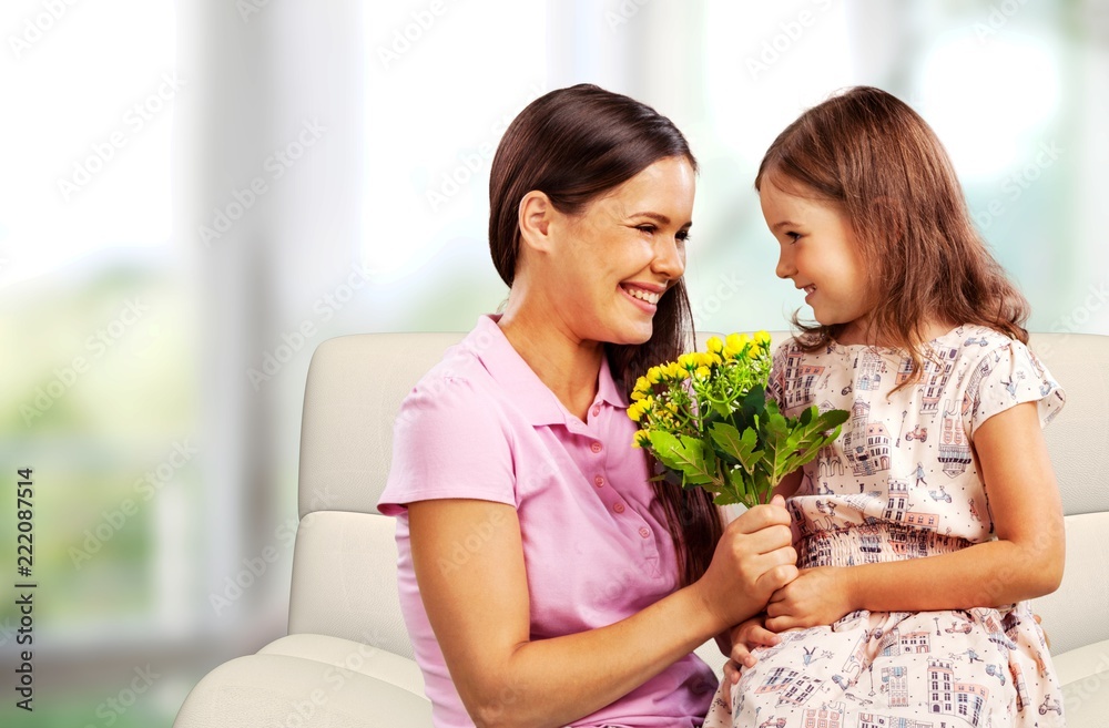 Happy Mother and daughter hugging Happy Mother and daughter hugging