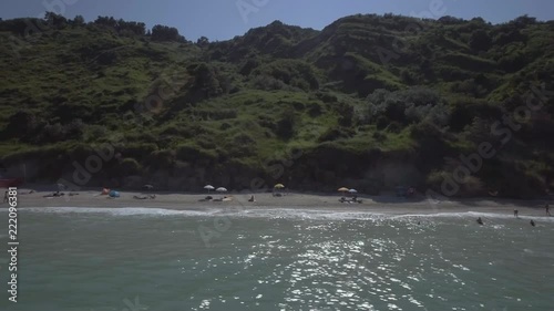 Drone Aerial of Mezzavalle Beach, hidden paradise bay with nice beach and beautiful rock in the sea many kind of fishes it is good for snorkeling photo