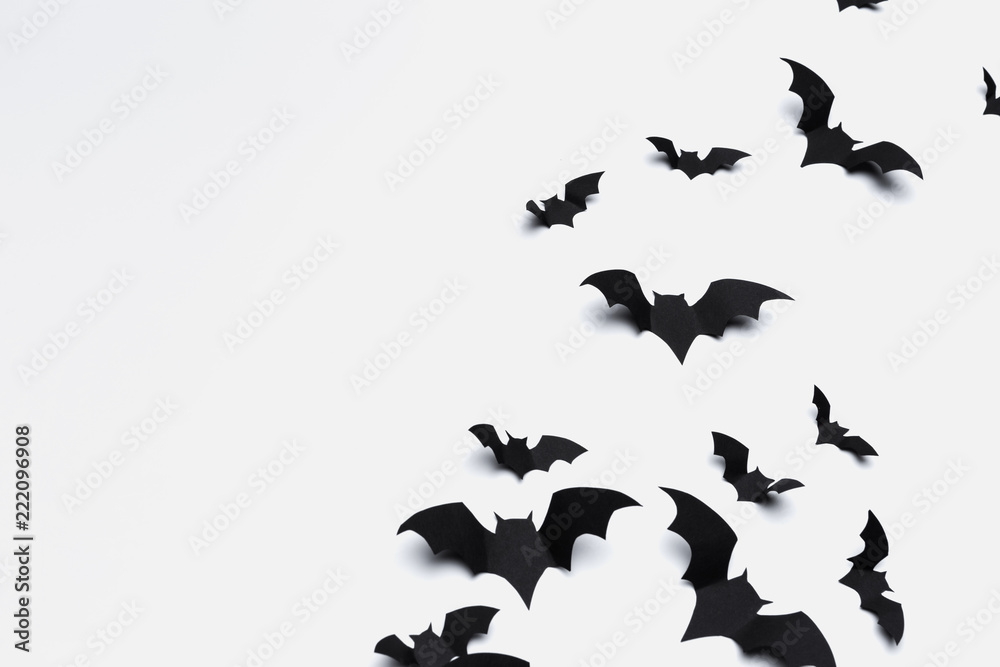 Obraz premium halloween and decoration concept - paper bats flying