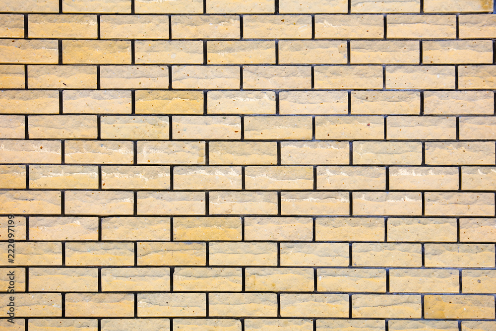 Yellow bricks in the wall as an abstract background Yellow bricks in the wall as an abstract background