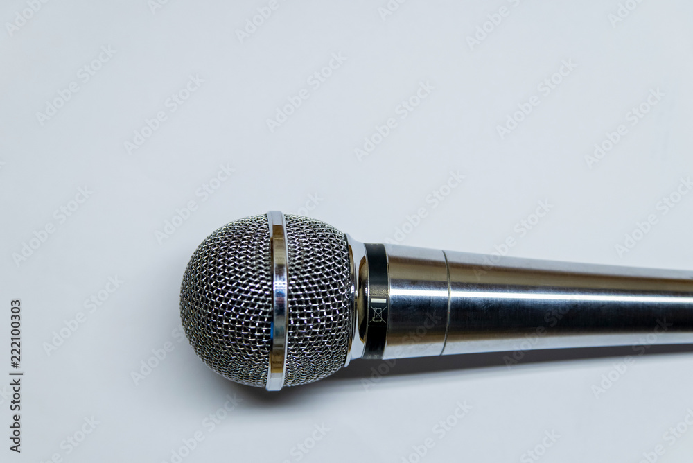 Obraz premium Silver audio microphone on white background
