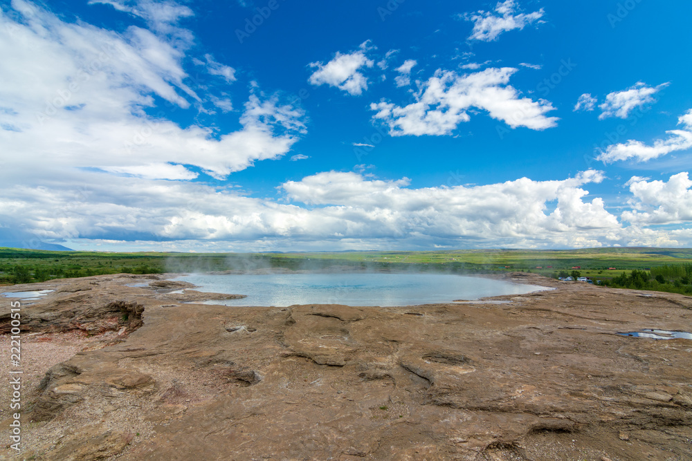 Geysir and Strokkur geysers at the Geysir geothermal Park Geysir and Strokkur geysers at the Geysir geothermal Park