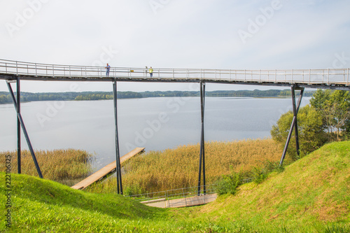 Urban city and peoples. Iron bridge on the lake. Green nature and city park. Travel photo 2018. photo