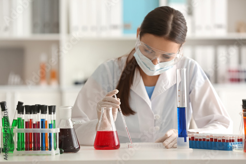 Female scientist working in...