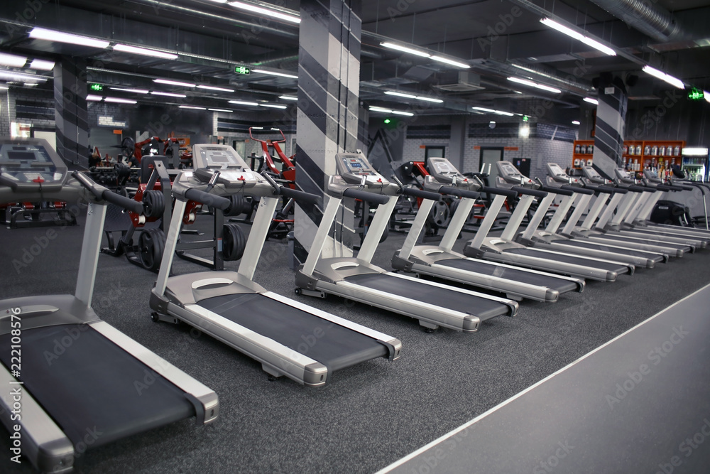 Modern equipment in new gym indoors