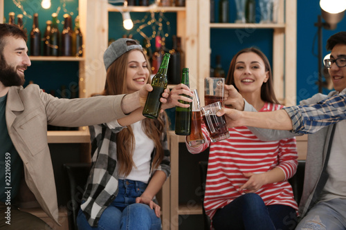 Group of cheerful friends d...