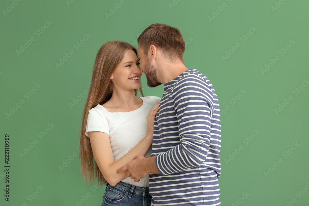 Happy young couple on color background Happy young couple on color background
