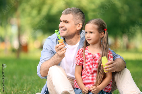 Happy father and daughter b...