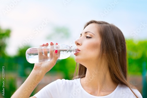 Portrait of a Woman Drinking Water