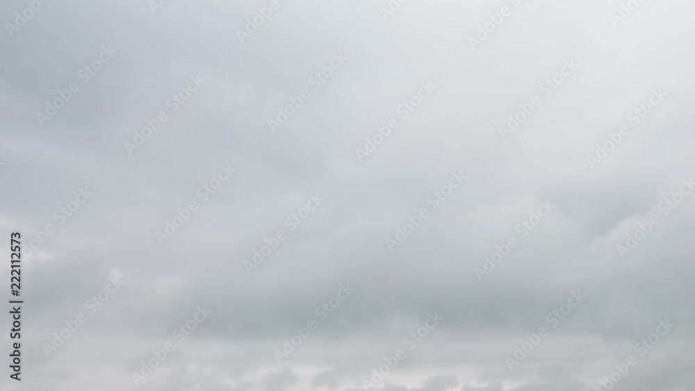 Russia, time lapse. Formation and rapid movement of white clouds of different shapes in the blue sky in late spring at sunset. Russia, time lapse. Formation and rapid movement of white clouds of different shapes in the blue sky in late spring at sunset.