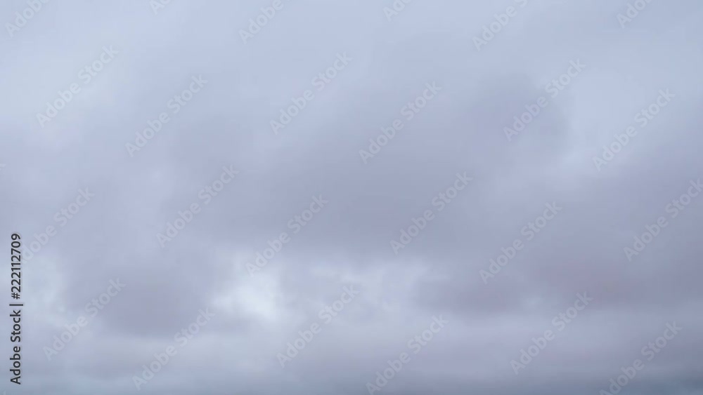 Russia, time lapse. Formation and rapid movement of white clouds of different shapes in the blue sky in late spring at sunset. Russia, time lapse. Formation and rapid movement of white clouds of different shapes in the blue sky in late spring at sunset.
