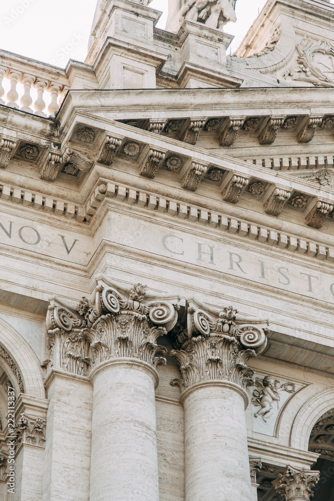 Fototapeta premium Salvatore Church in Rome, view from outside and inside. Frescoes and statues, architectural elements. A historic landmark, tourist destination. Ancient painting