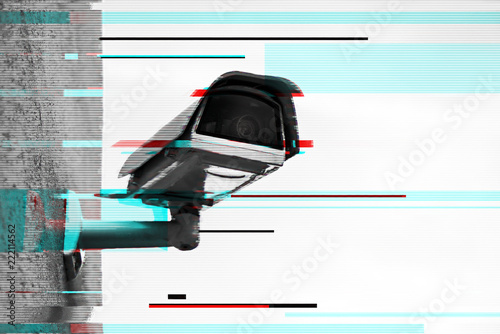 Close up of security camera with digital glitch effect