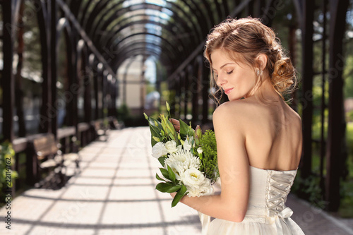 Beautiful young bride with ...