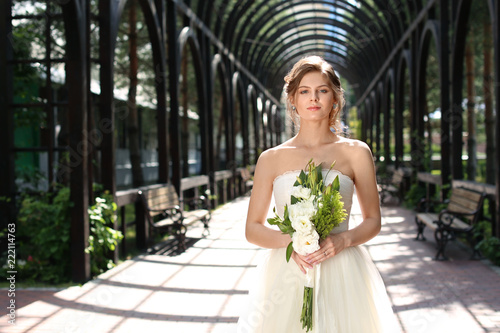 Beautiful young bride with ...