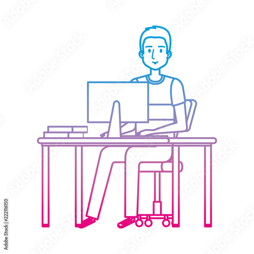 young man at desk with computer