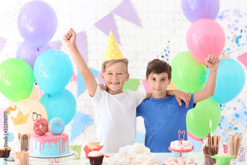 Cute little boys celebrating Birthday at home