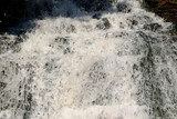 splashing water from a waterfall