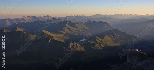 Lake Arnen and Saanenland Valley on a summer morning. View from Glacier 3000, Switzerland. photo