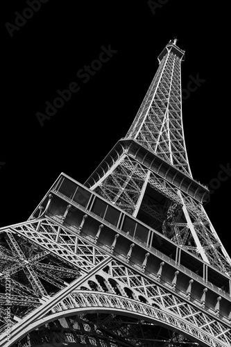Beautiful view of the Eiffel tower seen from beneath in Paris, isolated in black and white